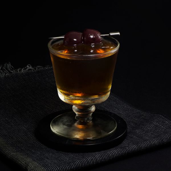 Black Manhattan cocktail photo